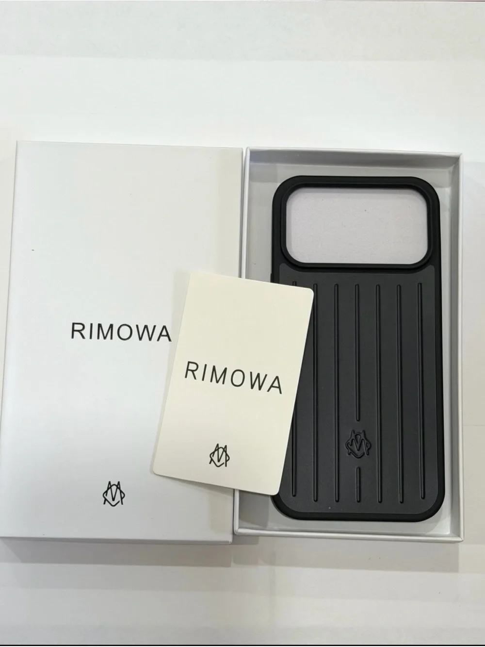 RIMOWA Black iPhone 17 Pro Max Case - Protective Ribbed Design